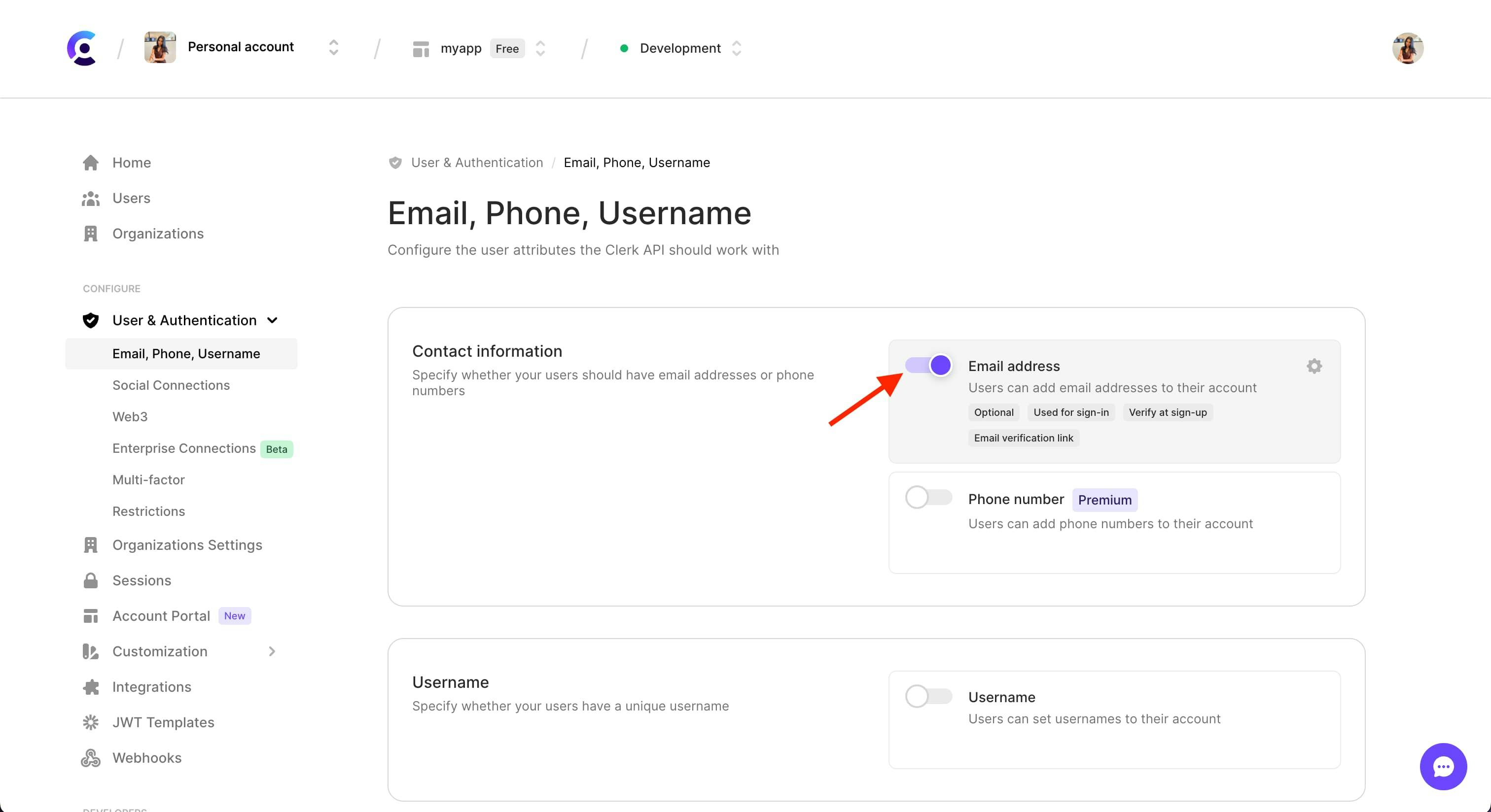 The 'Contact information' section of the 'Email, Phone, and Username' page in the Clerk dashboard. There is a red arrow pointing to the 'Email address' toggle, which is toggled on.